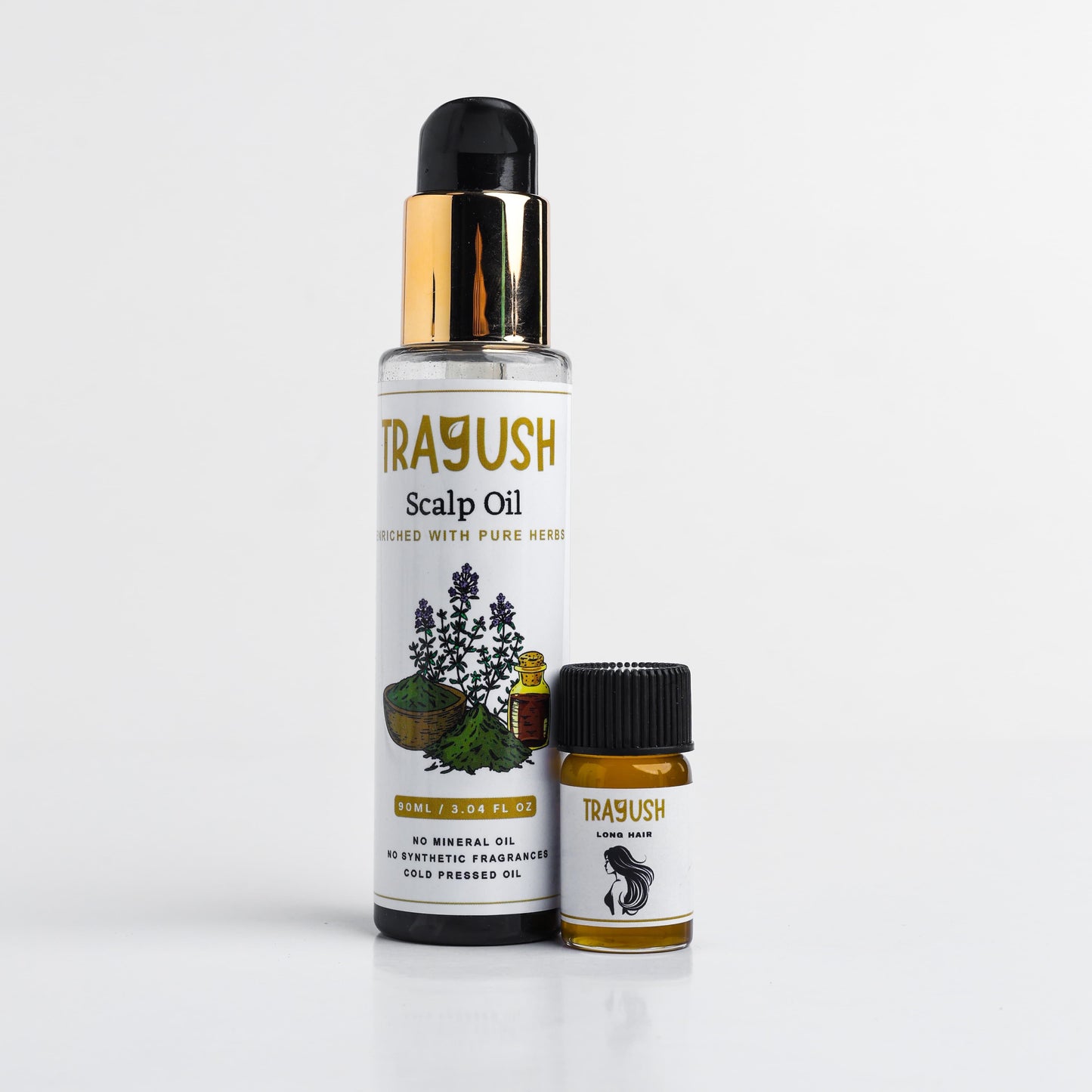 Two bottles of Trayush Scalp Oil on a white background