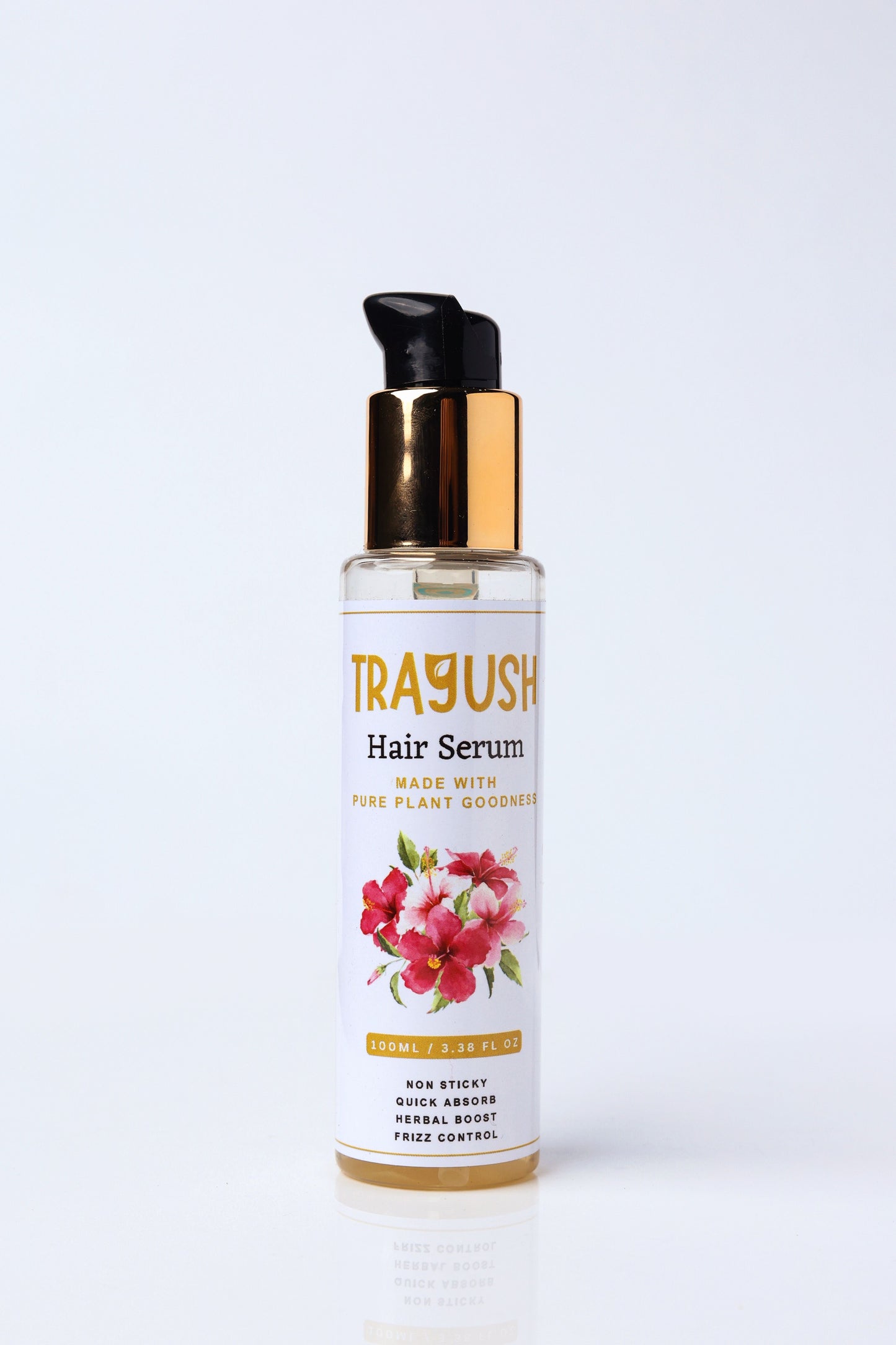 Trayush hair serum bottle with floral design on a white background