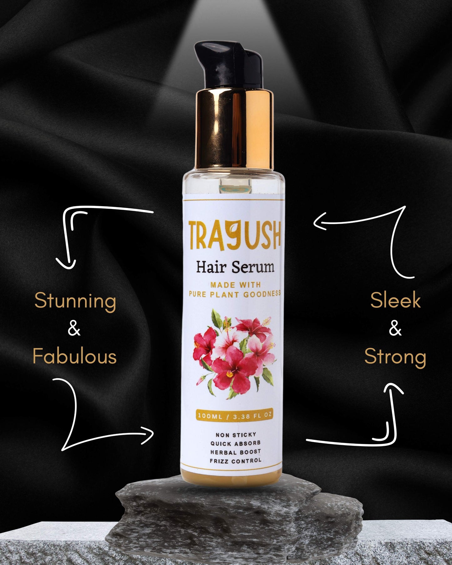 Trayush hair serum bottle with floral design on a black background
