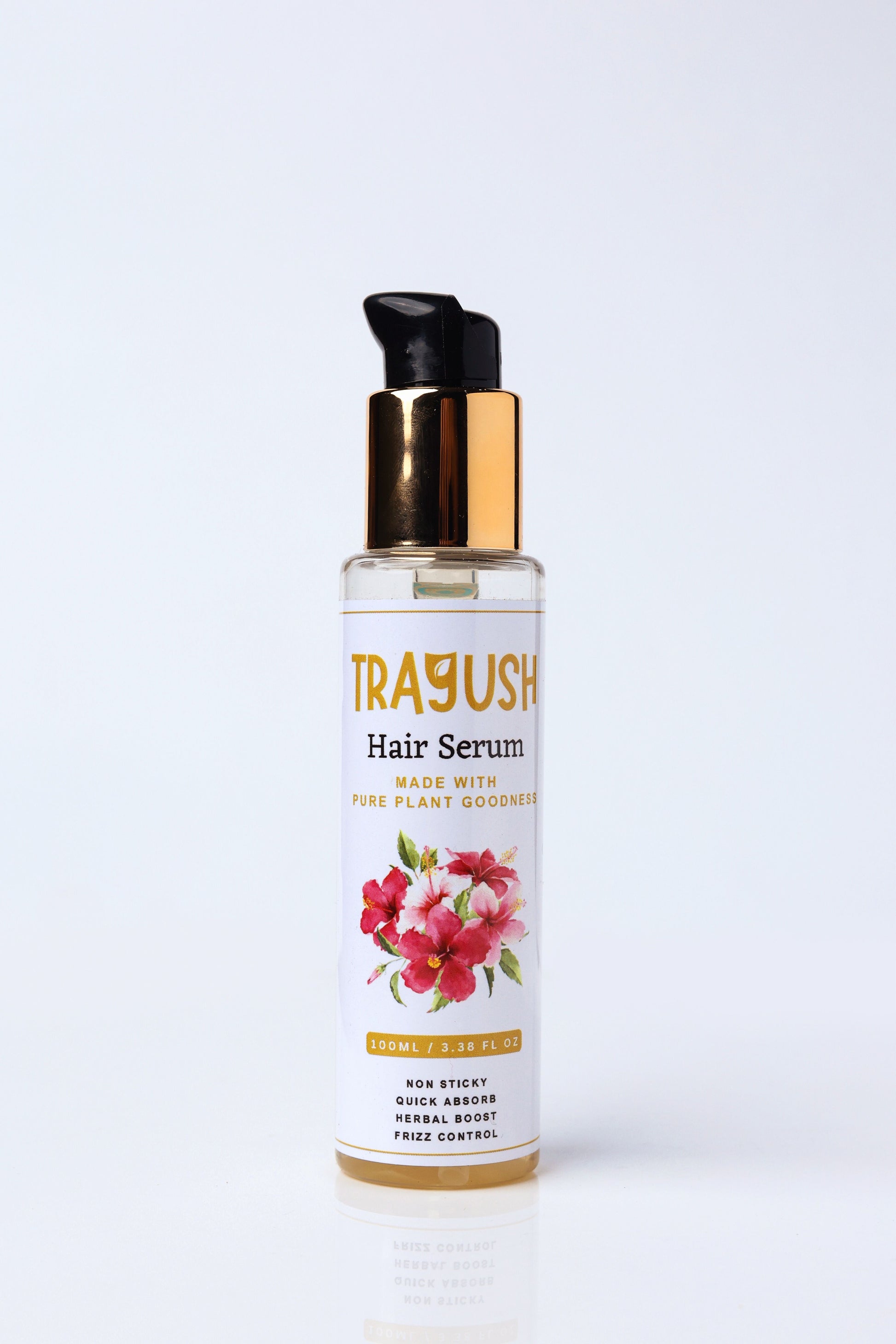 Trayush hair serum bottle with floral design on a white background