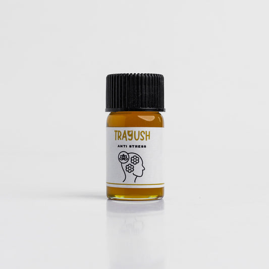 Small bottle labeled 'Trayush Anti Stress' on a white background