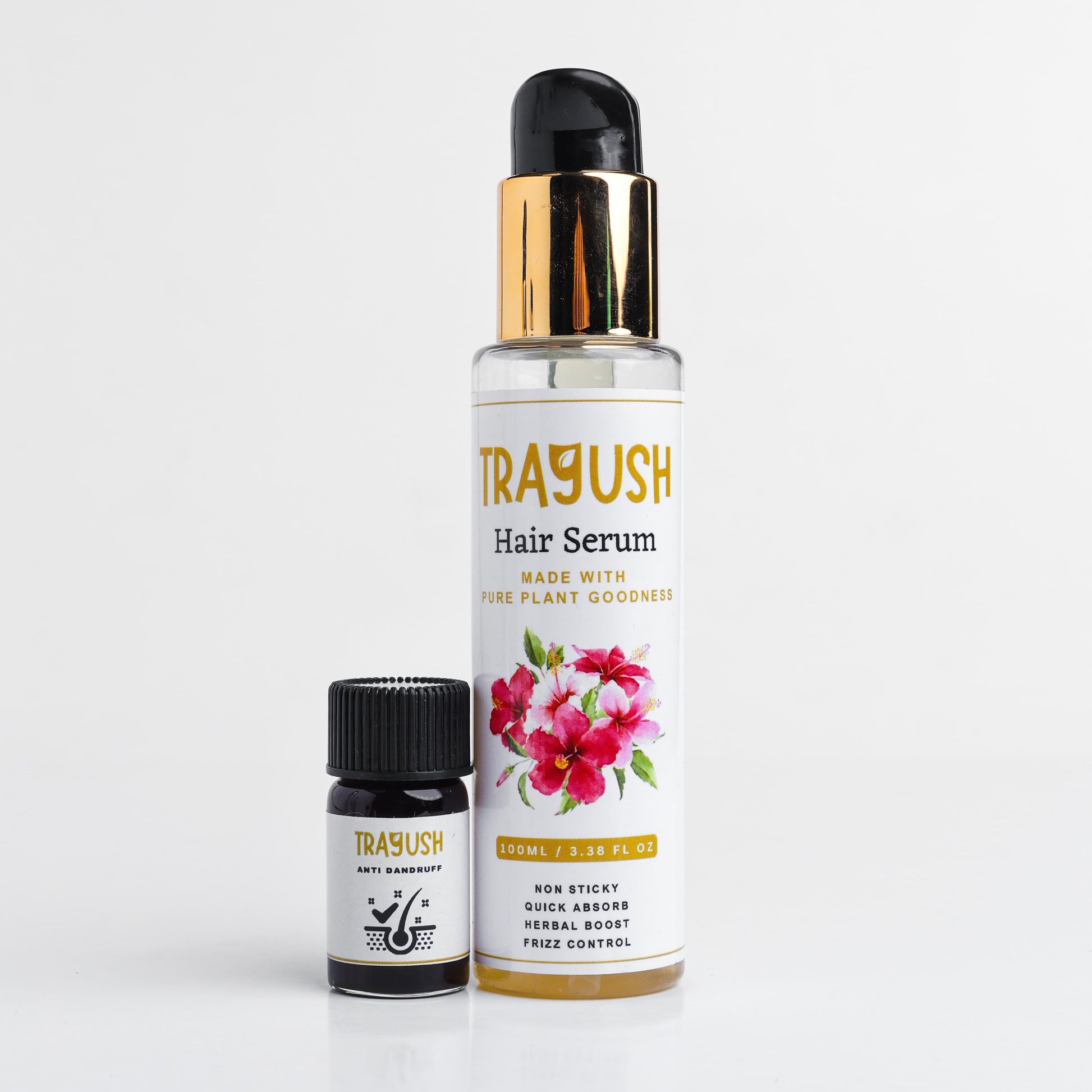 Trayush hair serum bottle with floral design on a white background